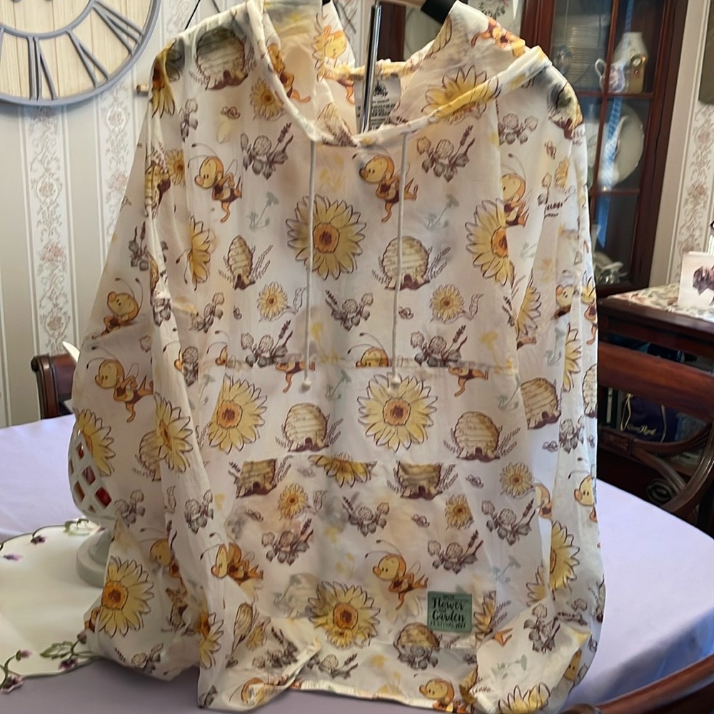 Disney flower and garden light weight windbreaker.